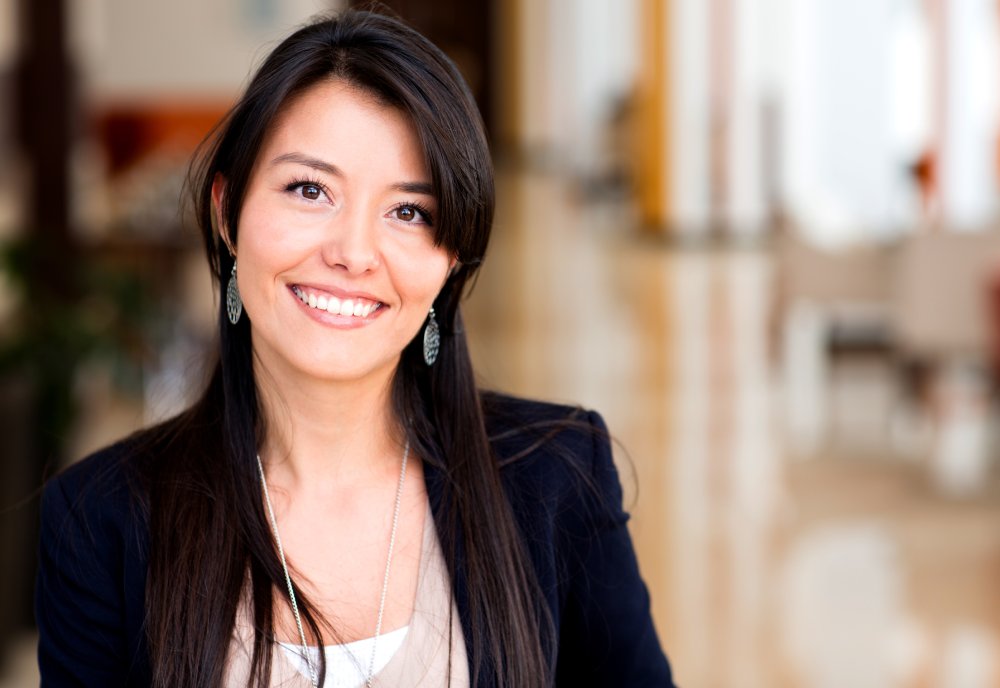 a corporate woman smiling