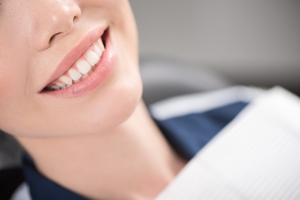 A woman with great teeth at the dentist