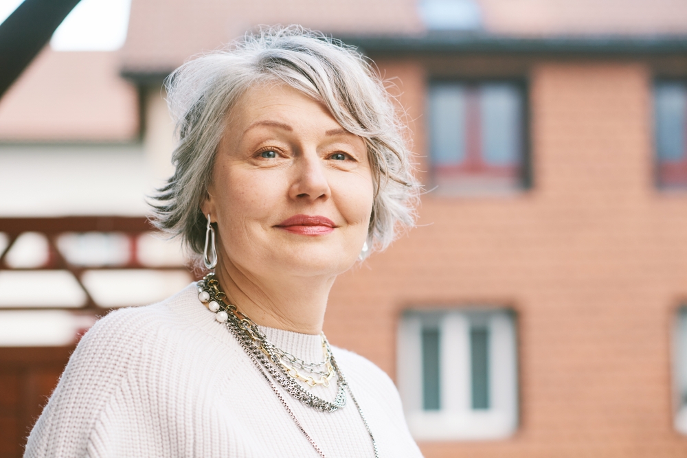 A portrait of a senior woman outdoors - Botox in Johns Creek GA