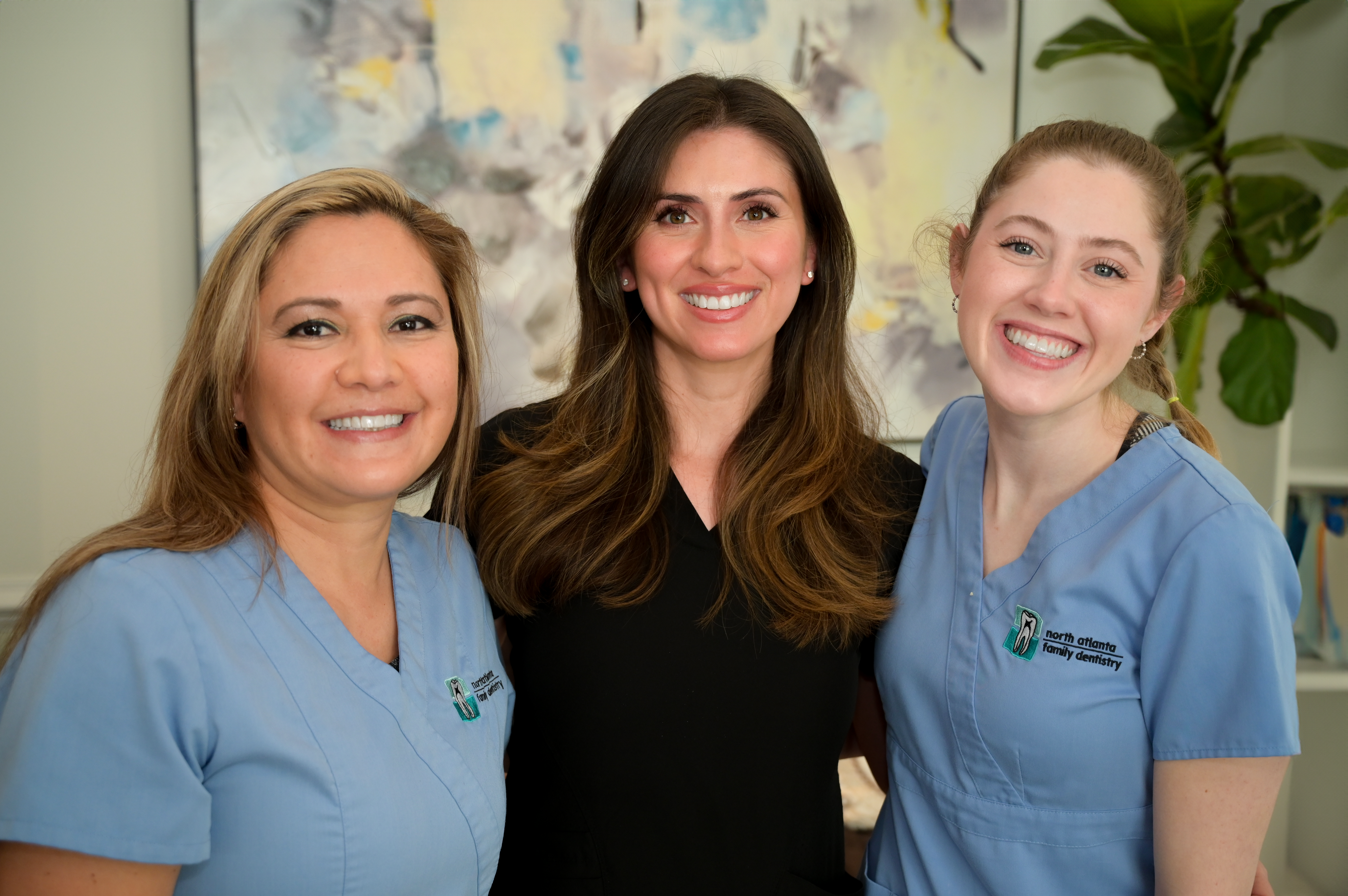 Dental Assistants and dental care team of North Atlanta Family Dentistry dental clinic smiling gracefully - North Atlanta Family Dentistry Dental Assistants and dental care team of North Atlanta Family Dentistry dental clinic smiling gracefully - North Atlanta Family Dentistry