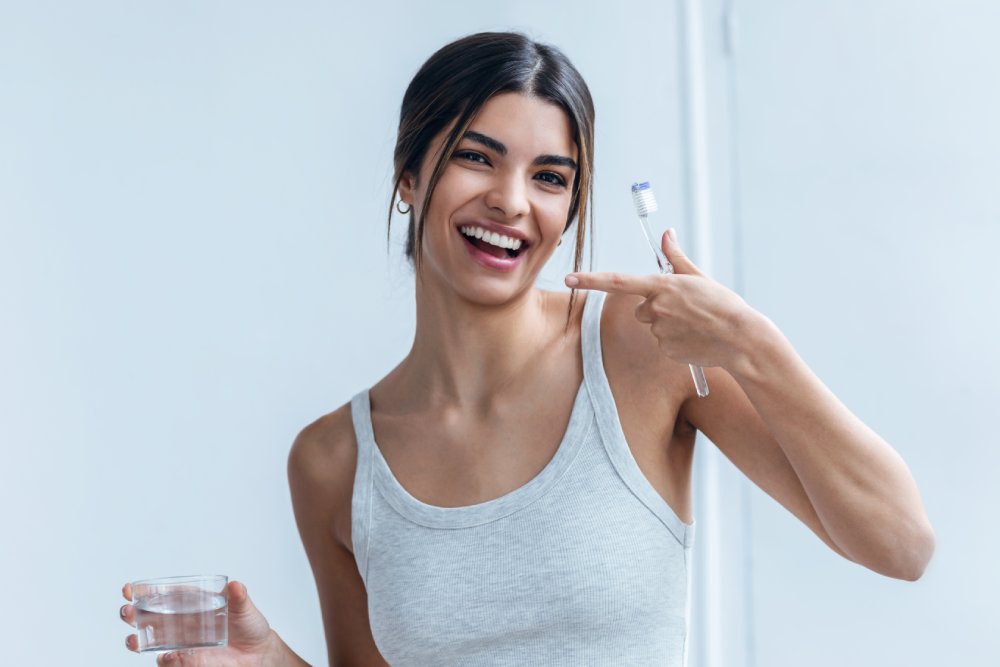 woman doing dental care