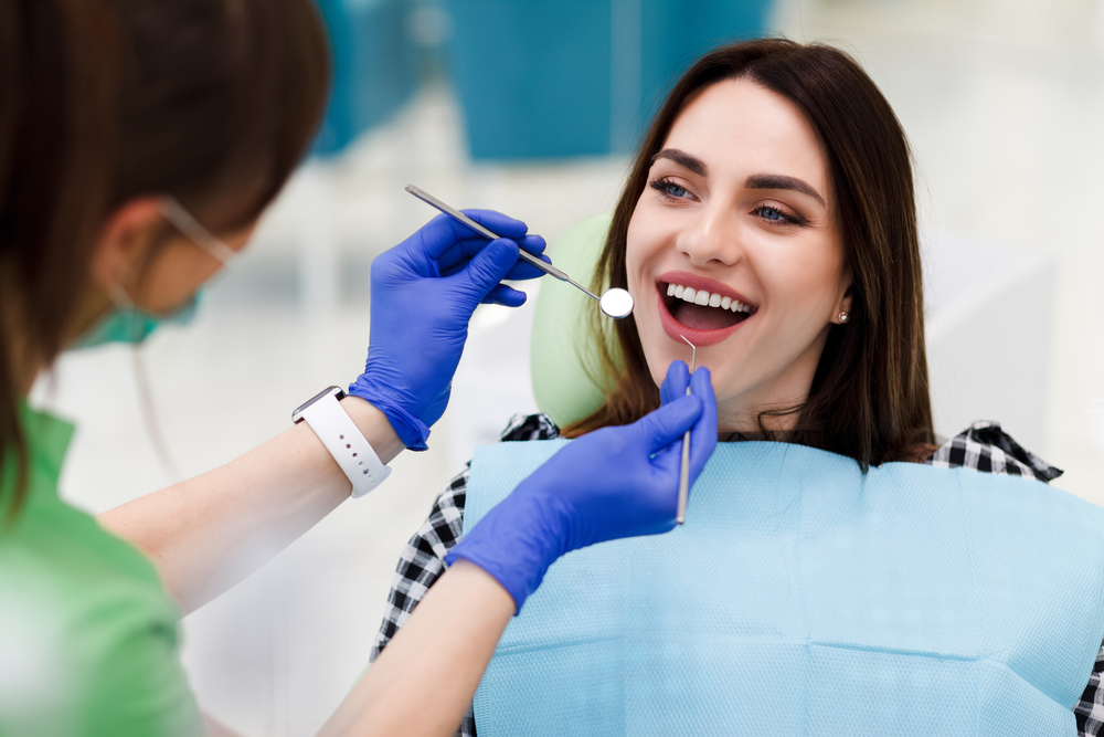 dark-haired woman at the dentist