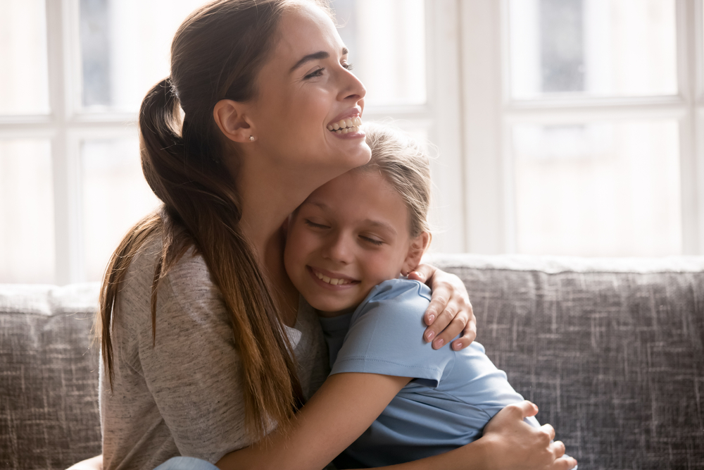 mother and daughter hugging