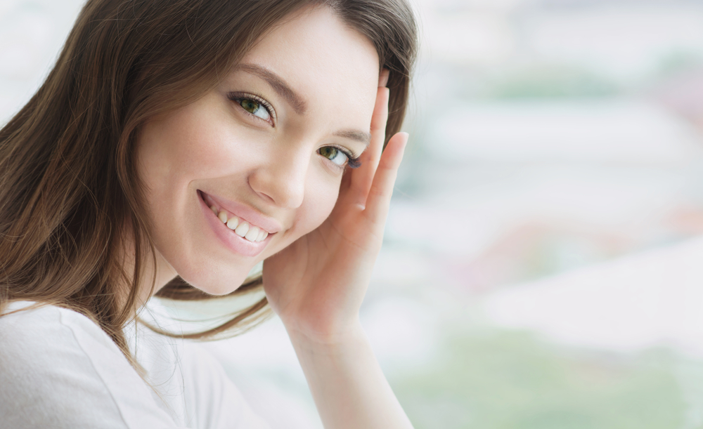 a white woman smiling