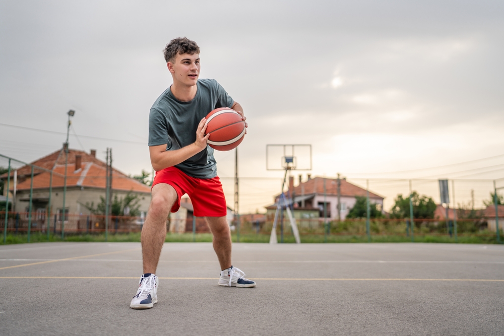 a basketball player playing