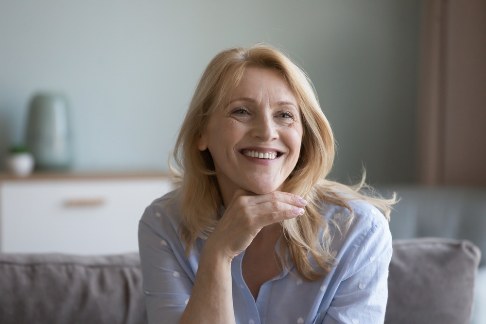 a middle-aged woman smiling
