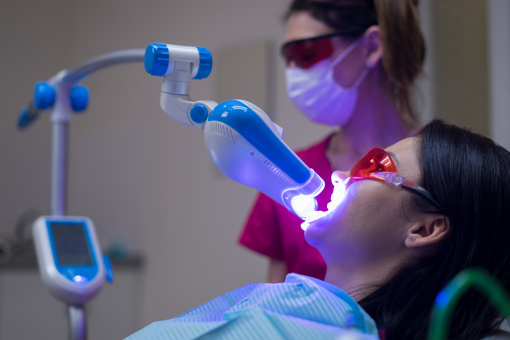 a woman having a Laser Dentistry session